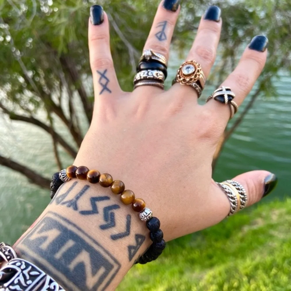 Tiger eye bracelet . Golden tiger eye gemstones & black lava rock bead bracelet